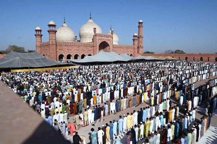 A large number of faithful are offering Eidul Fitr prayers at Badshahi Mosque