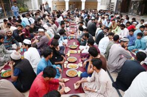 People offering Dua before breaking fast (Iftar) during Holy Month of Ramzan at Jamia Muhammadi Masjid.