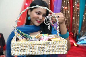 Vendors are busy arranging and displaying bangles to attract the customers at Jinnah Super Market in the Federal Capital in connection with upcoming Eidul Fitr