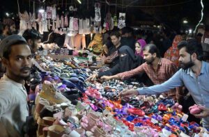 A large number of people busy in shopping at Resham Bazaar for preparation of upcoming Eidul Fitr.