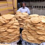 A vendor displays traditional Pheoni, a cherished Ramadan delicacy, for customers in connection with the Holy Month of Ramadan at Bakrani Road