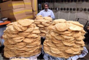 A vendor displays traditional Pheoni, a cherished Ramadan delicacy, for customers in connection with the Holy Month of Ramadan at Bakrani Road