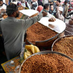 People purchasing the traditional food item (Pakoriyaa) mostly used in Dahi Bhalle during the holy fasting month of Ramzan