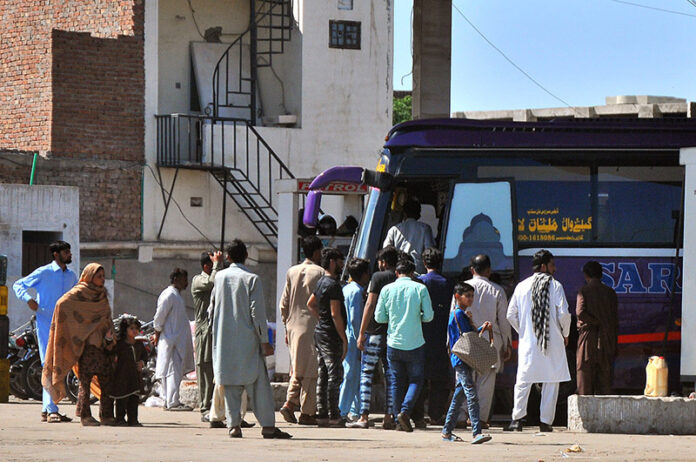 People are leaving for their hometowns at the General Bus Stand to celebrate Eid ul Fitr festival with their loved ones