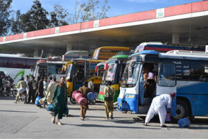 People waiting for Bus at Pirwadhai Bus Terminal leaving for their hometowns to celebrate Eid ul Fitr with their loved ones