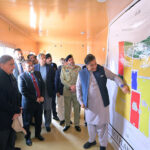 Prime Minister Muhammad Shehbaz Sharif being briefed about the layout plan of Danish University of Emerging Sciences