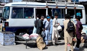 People leaving for their hometowns from Pirwadhai Bus Terminal to celebrate Eid holidays with their loved ones