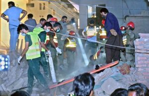 Rescue workers busy in rescue operation to pull out the owner of the house Teacher Naeemullah Baloch, who is trapped in the rubble after house collapsed in Sheikh Mohalla of Larkana city on late Tuesday Night.