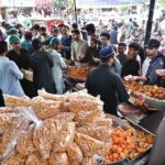 Large number of people purchasing goods for "Iftar" in the Holy Month of Ramadan at G-9 Markaz in the federal capital