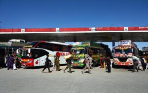 People leaving for their hometowns from Pirwadhai Bus Terminal to celebrate Eid holidays with their loved ones
