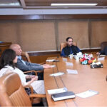 Federal Minister for Maritime Affairs, Junaid Inwar Chaudhry is being briefed by the CEO Syed Jarar Haider at Pakistan National Shipping Corporation head Office