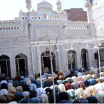 Muslim worshipers offer Juma tul Vida prayers during the holy fasting month of Ramzan in a local Mosque