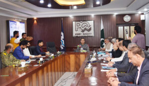 Federal Minister for Maritime Affairs Muhammad Junaid Anwaar Chaudhry chairing a meeting with Port Qasim Authority officers at the PQA office