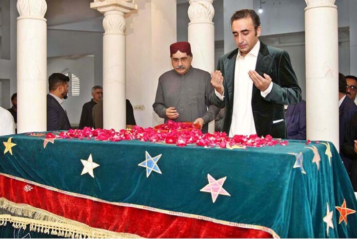 Chairman PPP Bilawal Bhutto Zardari offering Fateha on the grave of Shaheed Mohtarma Benazir Bhutto at Garhi Khuda Bakhsh on the first day of Eid-ul-Fitr