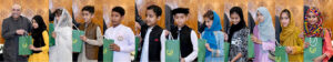 President Asif Ali Zardari distributing computer tablets among orphaned children during an Iftar Dinner hosted by him, at Aiwan-e-Sadr