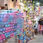 A view of encroachments on a wall of Resham Gali street by a shopkeeper, causing inconvenience to women who come to Reshma Gali for upcoming Eid-ul-Fitr shopping and needs the attention of concerned authorities