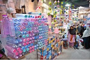 A view of encroachments on a wall of Resham Gali street by a shopkeeper, causing inconvenience to women who come to Reshma Gali for upcoming Eid-ul-Fitr shopping and needs the attention of concerned authorities
