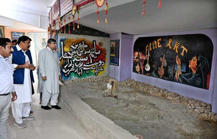 Commissioner Larkana division and Chairman Arts Council of Pakistan Larkana Tahir Sangi visiting at the Fine Art gallery at Arts Council