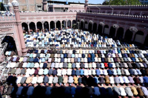 Worshipers offering prayers of last Friday in the holy month of Ramzan at Meezan Chowk