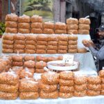 A vendor displaying ‘Pakoriyan’ to be used for ‘chaat’ to attract customers during holy fasting month of Ramazan