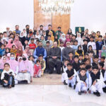 President Asif Ali Zardari in a group photo with the orphaned children during the Iftar Dinner hosted by him, at Aiwan-e-Sadr