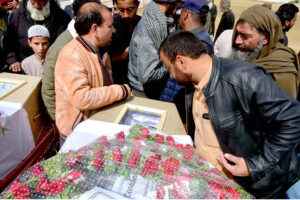 Syed Mazhar Ali Shah Secretary, Chairman Railways Islamabad along Muhammad Tahir Rai, HST, SI, PSP Inspector General Pakistan Railway Police CPO, Lahore and other railway officers offering funeral prayers of two martyrs railway personnel during terrorist attack on Jaffar Express near Bolan, at Railway Hockey ground