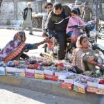 Women vendors selling bangles at their footpath setup