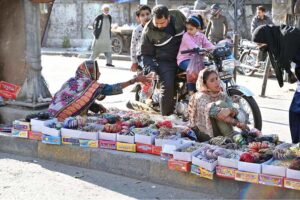 Women vendors selling bangles at their footpath setup