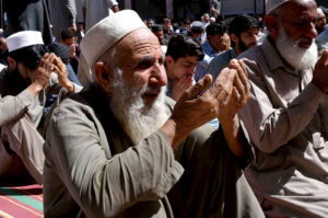 Worshipers offering prayers of last Friday in the holy month of Ramzan at Meezan Chowk