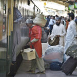 Passengers boarding on Special Eid Train leaving for their home towns to celebrate Eidul Fitr with their loved ones at Cantonment Railway Station Saddar