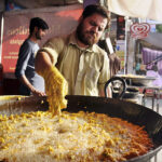 A Pakora Samosas seller in a local bazaar near Shadman town specially stablished in the fasting month of Ramadan