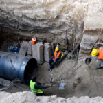 Sui workers installing gas pipeline project at Ferozepur