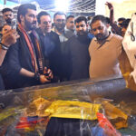 Famous Film Director and Actor Jawed Sheikh and others being briefing by JDC Foundation Pakistan Welfare Organization General Secretary, Zafar Abbas during visiting of Free Eid Bazar on The Title of "Maa hum bhi Eid Manaengy" organized by JDC