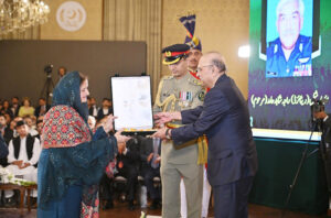 President Asif Ali Zardari conferring the award of Nishan-i-Imtiaz (posthumous) upon Air Marshall (r) Raja Shahid Hamid (late) in recognition of his public services, at the investiture ceremony to confer the insignias of Civil Awards, at Aiwan-e-Sadr.