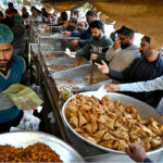 A large number of people buying food items for Iftar in the fasting month of Ramadan ul Mubarak at Blue Area