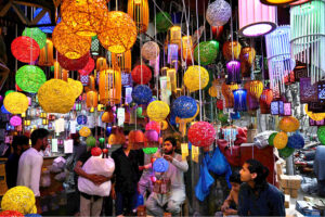A vendor displaying colorful lights for decoration at Shah Alam Market in the Provincial Capital