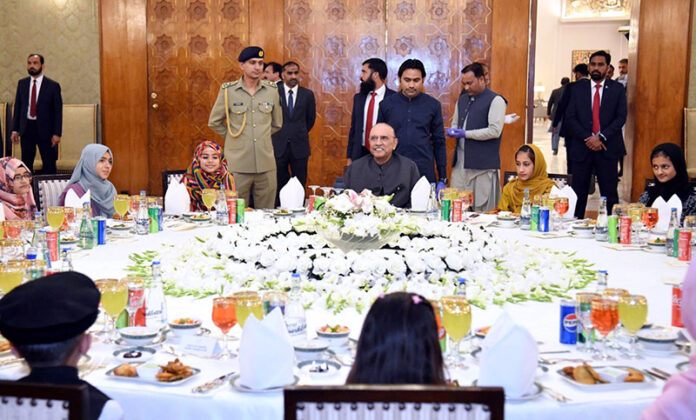 President Asif Ali Zardari interacting with children during an Iftar Dinner hosted by him for the orphaned children under the care of Pakistan Orphan Care Forum, at Aiwan-e-Sadr