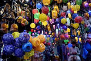 A vendor displaying colorful lights for decoration at Shah Alam Market in the Provincial Capital