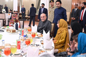 President Asif Ali Zardari interacting with children during an Iftar Dinner hosted by him for the orphaned children under the care of Pakistan Orphan Care Forum, at Aiwan-e-Sadr