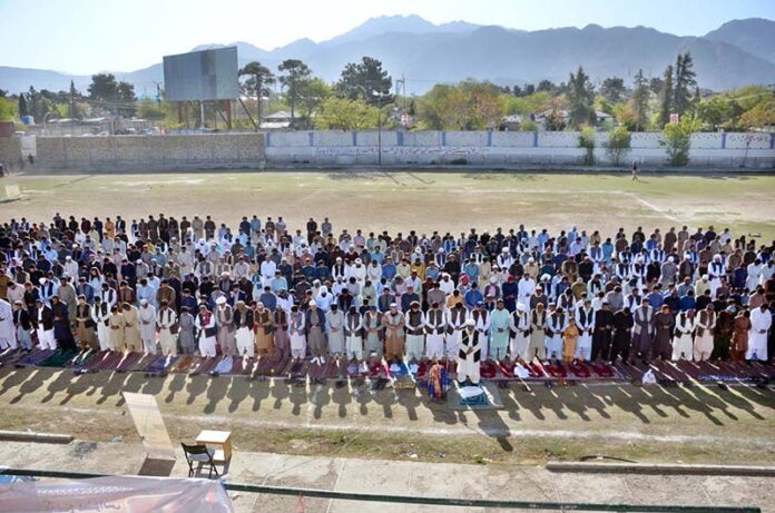 A large number of faithful offering Eidul Fitr prayers at Hockey Chowk