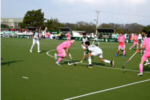 Players of Germany and Pakistan Juniors Hockey teams in action during final match at Naseer Bunda Hockey Stadium, Sports Complex
