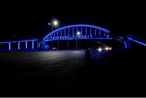 An attractive view of pedestrian bridge over 7th avenue beautifully decorated with lights in the holy fasting month of Ramadan