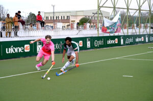 Players of Germany and Pakistan Juniors Hockey teams in action during final match at Naseer Bunda Hockey Stadium, Sports Complex