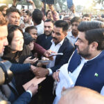 Sindh Governor Kamran Khan Tessori receives applications from the complaints during an Iftar reception to the common people at Governor House