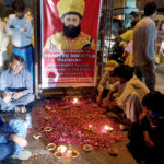Civil society activists organize a candlelight vigil in front of Karachi Press Club to pay homage to " Shaheed Sooriyah Badshah" Pir Sibgatullah Rashidi Shaheed on his death anniversary