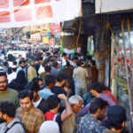 People purchasing food for Iftari at Burns Road