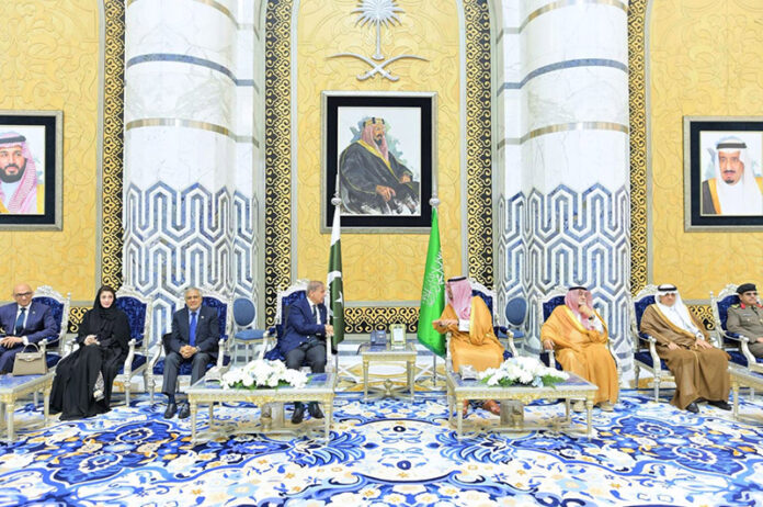 Deputy Governor of Makkah, Prince Saud bin Mashal bin Abdul Aziz Al-Saud welcomes Prime Minister Muhammad Shehbaz Sharif upon his arrival