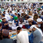 A large number of Muslims offering Dua before breakfast at Iftar sitting in “Itikaf” (Seclusion) at Faizan-e-Madina Mosque old Sabzi Mandi. Special arrangements had been made for the devotees in mosques where the worshipers spend the last 10 days/nights of Ramadan, observing their fasting and performing special prayers