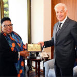 Federal Minister for Defence, Khawaja Muhammad Asif presenting a souvenir to Dr. Thobekile Gamede, Acting Secretary of Defence of South Africa