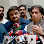 Federal Minister for Railways Muhammad Hanif Abbasi talking the media persons during press conference at Lahore Railway Station